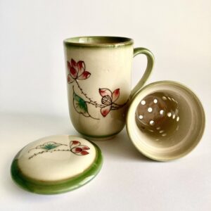 Ceramiczny kubek do herbaty z zaprzaczem Zielony Ogród